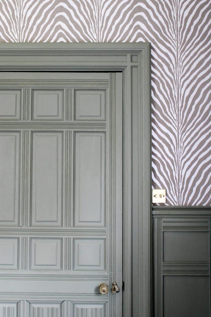 High end interior entrance way Interior appeal High quality panelled tall door Sage green panelled entrance door Spring home interior colours